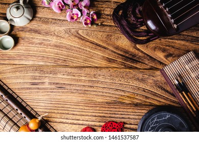 Just above the angle of view close up Chinese style decoration on the wooden table Guqindong Taiwan writing brush tea set etc.