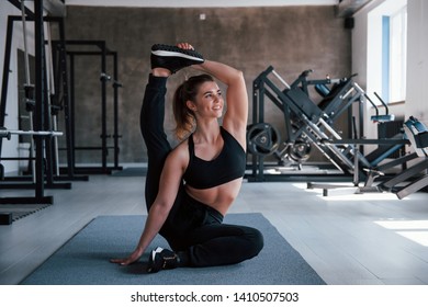 Just Hold Like That For Some Time. Photo Of Gorgeous Blonde Woman In The Gym At Her Weekend.