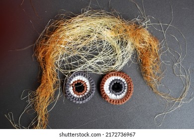 Just Kidding With Funny Face From Food Art, Hair From Corn Silk With Two Crochet Eyes On Make Funny On Grey Background