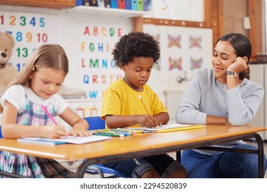 I just love watching their little achievements. Shot of a young woman teaching a class of preschool children. - Powered by Shutterstock