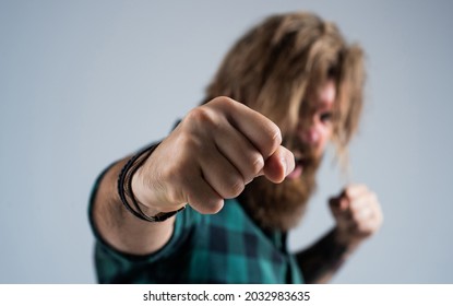 Just One Hit. Bearded Man Punching With Fist. Boxing Concept. Negative Human Emotions. Anger And Aggression. Angry Mature Brutal Hipster Fighting. Knockout. Casual Fashion Style