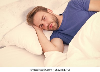 Just One More Minute In Bed. Sleepy Man Lying In Bed On Waking In The Morning. Tired Man Falling Sleep In Bed. Its Bed For Me.