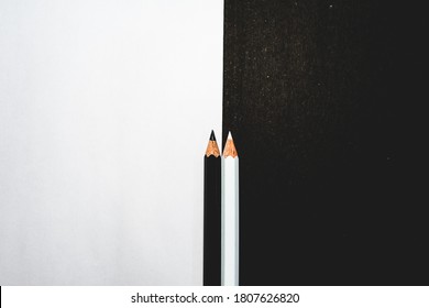 Just Two Pencils Explaining The Contrast