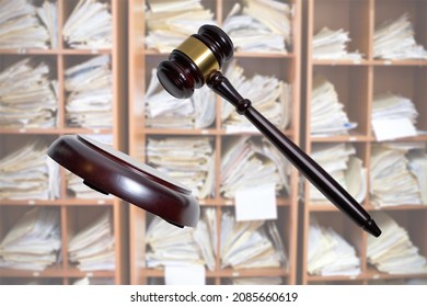 justice gavel and block with backlog files - Shutterstock ID 2085660619