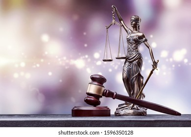 Justice lady with scales of and wooden hammer