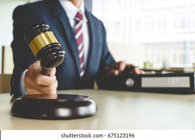 Justice and Law concept. lawyer working at courtroom, selective focus - Shutterstock ID 675123196