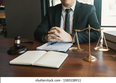 Justice And Law Concept With Male Lawyer In The Office.