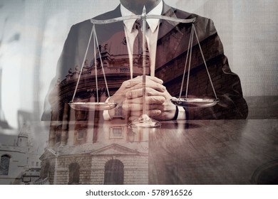 Justice And Law Concept.Male Lawyer In The Office With Brass Scale On Wooden Table With London City Background,double Exposure