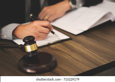 Justice Lawyer / Judge Gavel Working With Legal Documents In A Court Room