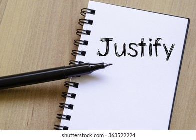 Justify text concept write on notebook with pen