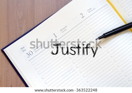 Justify text concept write on notebook with pen