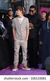 Justin Bieber, Tito Jackson At Michael Jackson Immortalized At Grauman's Chinese Theatre, Hollywood, CA 01-26-12