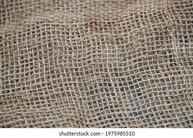 Jute Gunny Bag Texture. Used Gunny Bag In The Field.