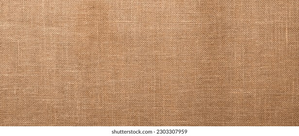Jute pattern, rough burlap texture, canvas coarse cloth, brown woven rustic bagging. Natural hessian beige textile texture. Linen fabric backdrop. Threads background. Sackcloth surface, material.