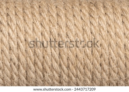 Jute ropes closeup, background texture. thick hemp rope. linen rope-wound. Hank ship rope