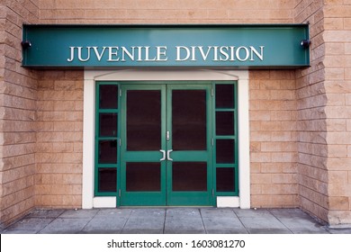 Juvenile police building door entrance. - Shutterstock ID 1603081270