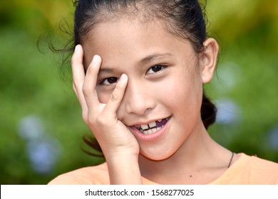 A Juvenile Teen  And Shyness