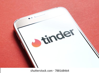 JYVASKYLA, FINLAND - JANUARY 4, 2018: Tinder logo on smartphone screen. Tinder is a social search and dating mobile app. Illustrative editorial.