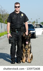 A K9 Police Officer With His Dog.