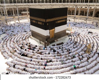 Kaaba the Holy mosque in Mecca with Muslim people pilgrims of Hajj praying in crowd (newest and very rare images of Holiest mosque after latest widening 2013-3014)