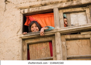 Kabul, AFGHANISTAN August 2004 : Shy Afghan Girls Looking Out A 