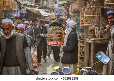 Kabul, Afghanistan - Circa October 2011: Photo Of Marketplace Full Of Shopping People In Old Town, Old City Part In Kabul. In This Market People Can Buy And Sell Birds In Cages. Documentary Editorial.