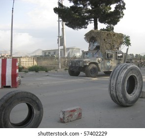 KABUL, AFGHANISTAN - JUNE 1: Afghan Army Hummer Waits At A Road Block On June 1, 2010 In Kabul, Afghanistan. The Afghan National Army Is Slowly Taking Over Control Of The City From Foreign Forces.