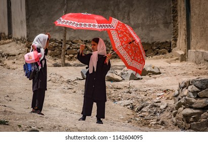 Kabul, Afghanistan - May 2004: Girls Returning From School In Kabul