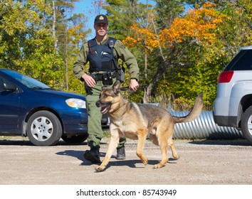 KAGAWONG, ONTARIO, CANADA -OCTOBER 1: Police Dog Demonstration Showing Drug Sniffing And Attack Training On October 1, 2011 In Kagawong, On Manitoulin Island, Ontario Canada.