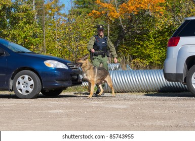 KAGAWONG, ONTARIO, CANADA -OCTOBER 1: Police Dog Demonstration Showing Drug Sniffing And Attack Training On October 1, 2011 In Kagawong, On Manitoulin Island, Ontario Canada.