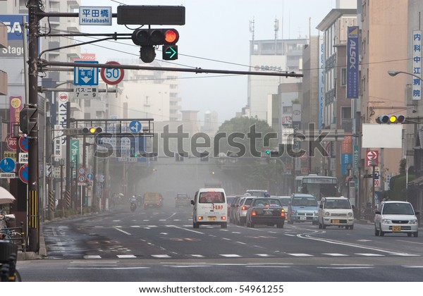 KAGOSHIMA CITY, JAPAN - JUNE 3:\
Traffic is affected as ash blankets the city after an  eruption of\
the  volcano Sakurajima   June 3, 2010 in Kagoshima City,\
Japan.