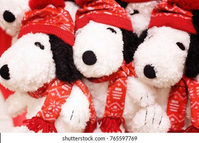 KAGOSHIMA, JAPAN - DECEMBER 10, 2011: Stuffed Plush Snoopy Toys In Red Scarf And Cap In Store On The Eve Of Christmas