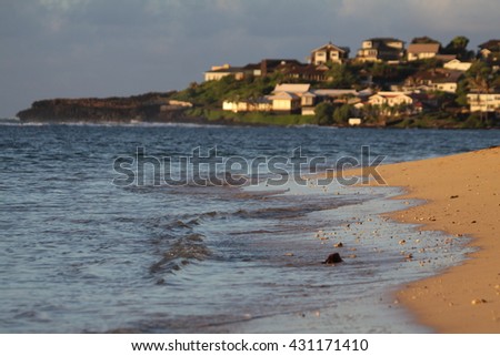 Kahala Beach with sparse clouds on a beautiful day on Oahu, Hawaii.