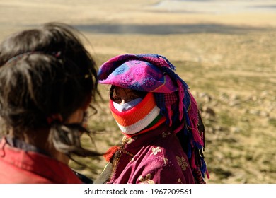 Kailash Area Tibet China - 06 23 2008: Tibetans Pilgrim During The Second Day Of Ritual Kora Around Sacred Mount Kailash. Tibetan Woman In In Traditional Clothing