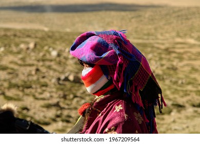 Kailash Area Tibet China - 06 23 2008: Tibetans Pilgrim During The Second Day Of Ritual Kora Around Sacred Mount Kailash. Tibetan Woman In In Traditional Clothing