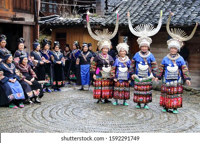 Kaili, China - October 27, 2019: At Jidao Village, portrait of people, wearing typical clothes and headgear of Miao minority