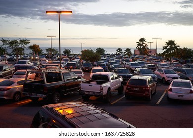 Kailua-Kona, Hawaii, USA - Nov 28, 2019: A Full Parking Lot Outside A Walmart Supercenter In The Evening.