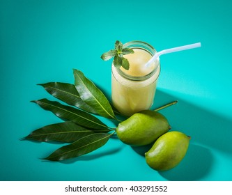 Kairi Panha OR Panna OR Raw Mango Drink is a traditional and most popular Indian summer beverage served in a glass over colourful or wooden background. Selective focus