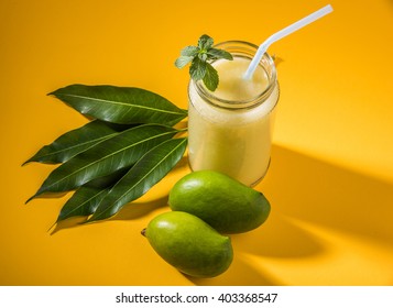 Kairi Panha OR Panna OR Raw Mango Drink is a traditional and most popular Indian summer beverage served in a glass over colourful or wooden background. Selective focus