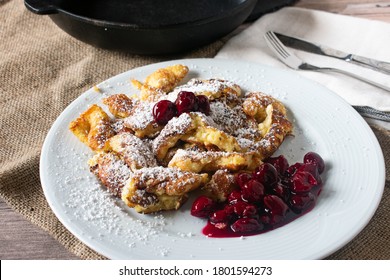 "Kaiserschmarrn" on a white plate - original austrian pancake - Shutterstock ID 1801594273
