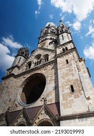 Kaiser-Wilhelm Memorial Church And New Church Called German Church In Kurfürstendamm, Heart Of Berlin In Germany