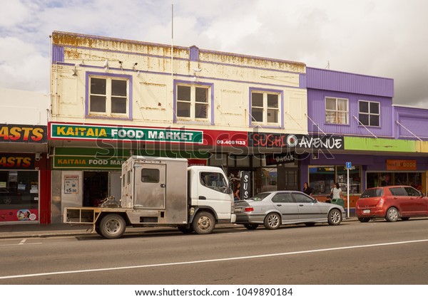 KAITAIA, FAR NORTH, NORTHLAND, NEW ZEALAND -\
MARCH 2018: Typical main street scene with Kaitaia Food Market,\
cars and pedestrians.