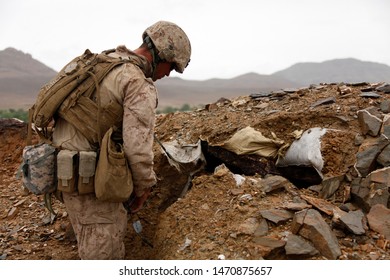 Kajaki, Afghanistan - April 22, 2012: US Marine Prepares C4 Charges To Destroy And Enemy Fighting Position.