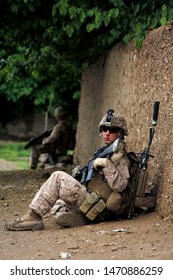 Kajaki, Afghanistan - April 22, 2012: US Marine Rests During A Break In Patrol. 