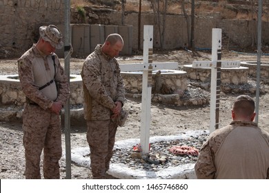 Kajaki, Afghanistan - February 4, 2012: US Marines Pay Tribute To Fallen Comrades. 