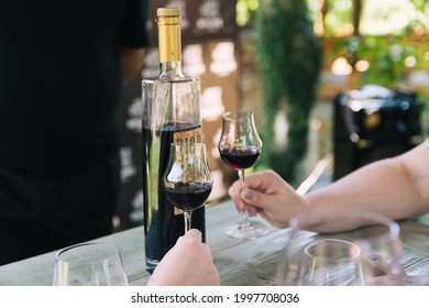 Kakheti, Georgia - June 15, 2021: Red And White Wine Tasting In Georgia