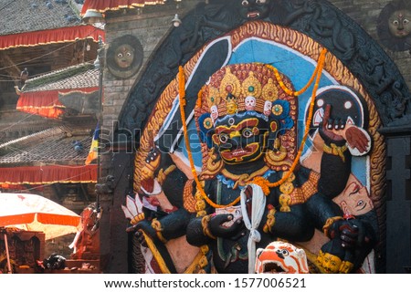 Kal Bhairav statue at Durbar Square in Kathmandu, Nepal. Hindu tantric deity worshiped by Hindus. In Shaivism, the brutal manifestation of Shiva associated with the destruction. Stock photo © 