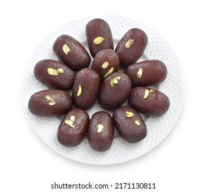 Kala Jamun or Black Gulab Jamun is a delicious and juicy sweet snack.  - Shutterstock ID 2171130811