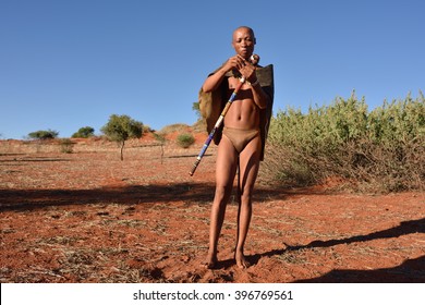 KALAHARI, NAMIBIA - JAN 24, 2016: Bushmen hunter in the Kalahari desert. San people, also known as Bushmen are members of various indigenous hunter-gatherer peoples of Southern Africa