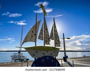 KALAMATA, GREECE - JANUARY 2022: Iconic View Of A Decorated Sailing Boat During Christmas In Kalamata, City, Messinia, Greece